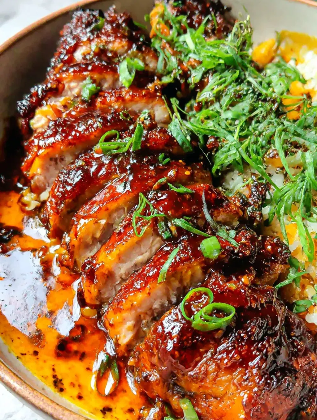 A plate of caramelized soy chicken garlic broth.