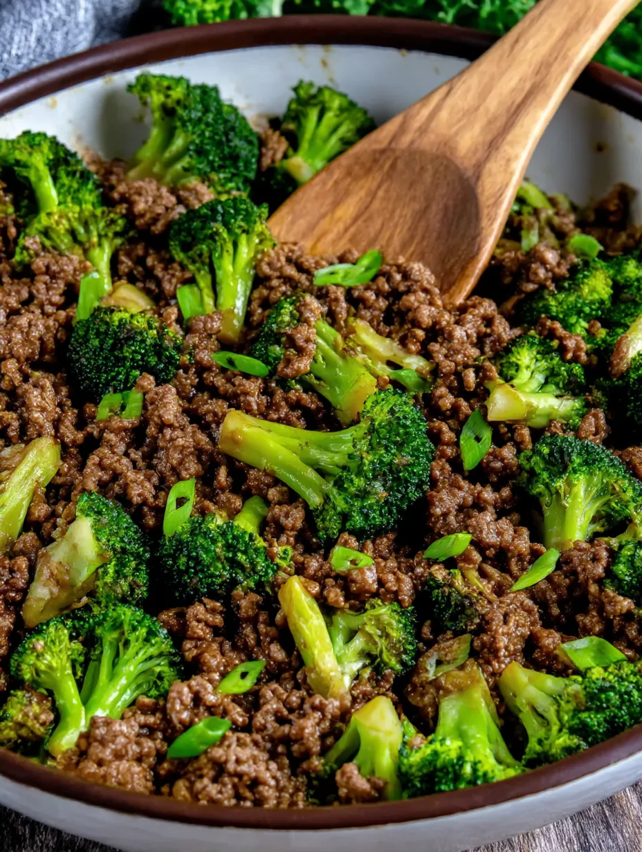A skillet of ground beef and broccoli.