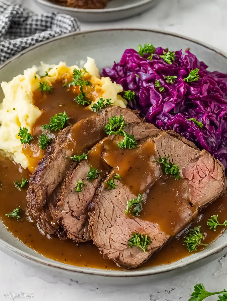 A plate of food with meat and vegetables.