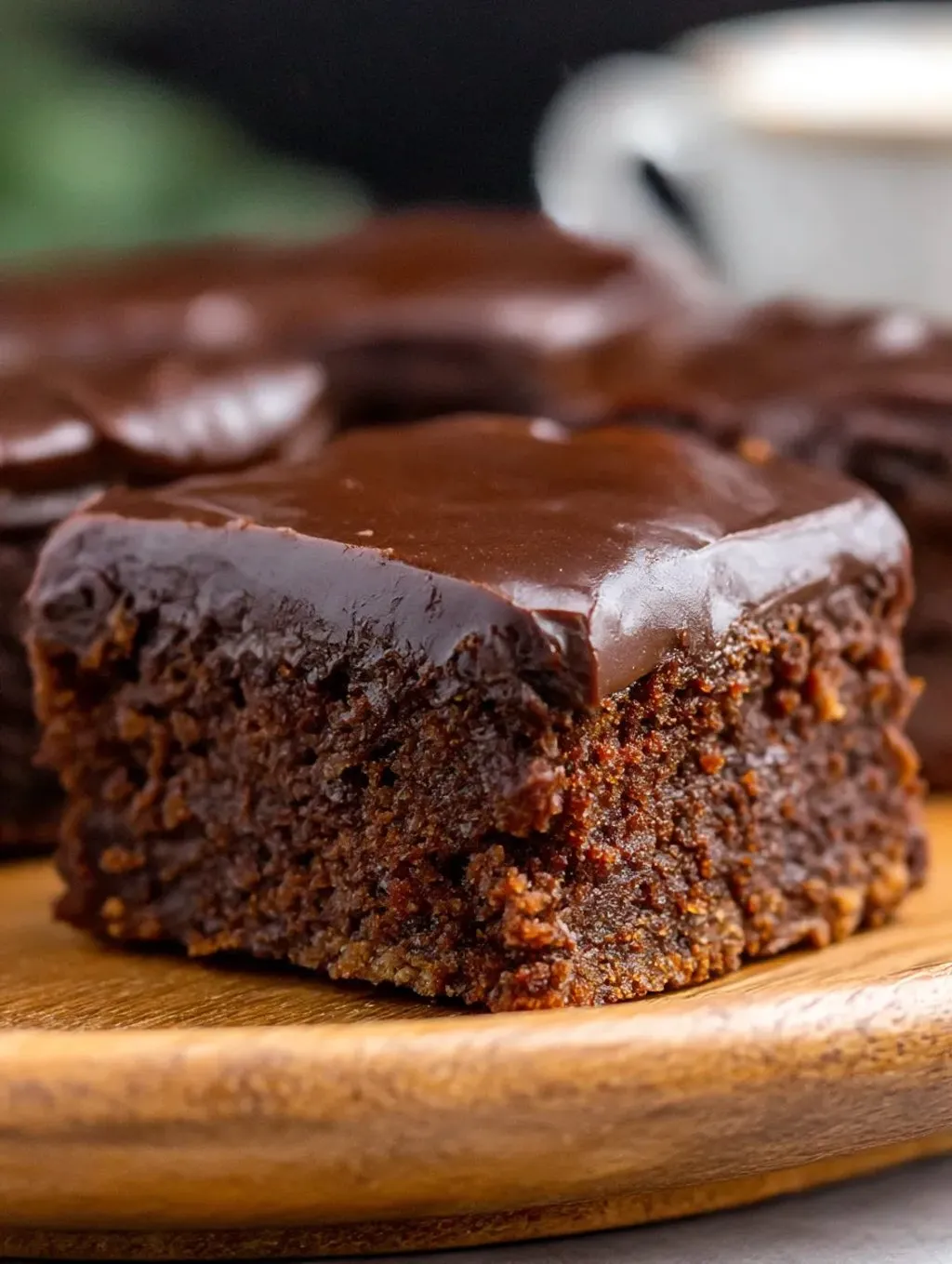 A slice of chocolate cake with a sweet potato topping.