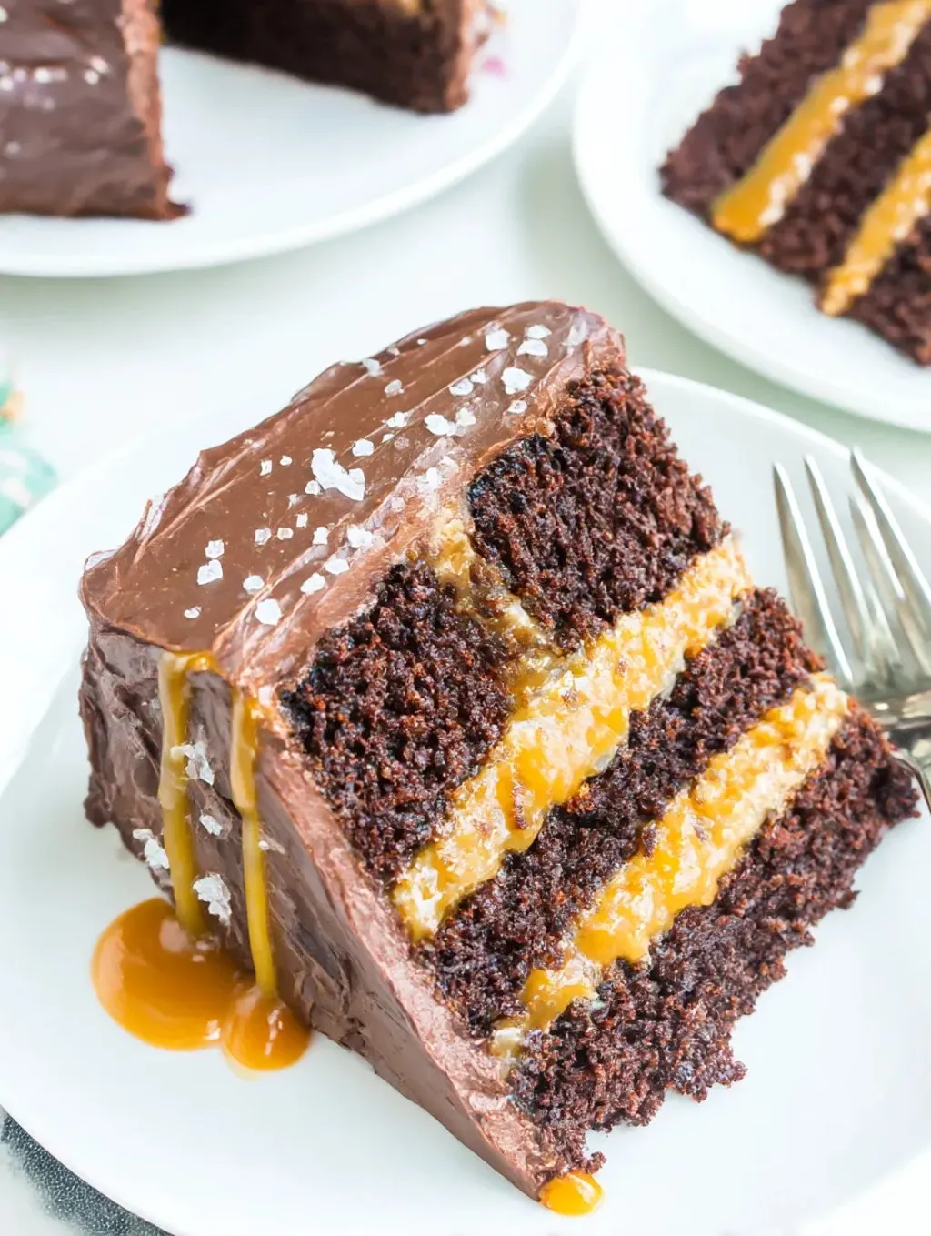 A slice of salted caramel chocolate cake.