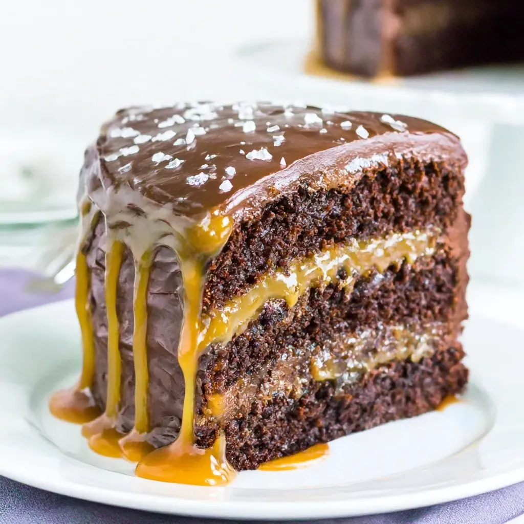 A slice of salted caramel chocolate cake.