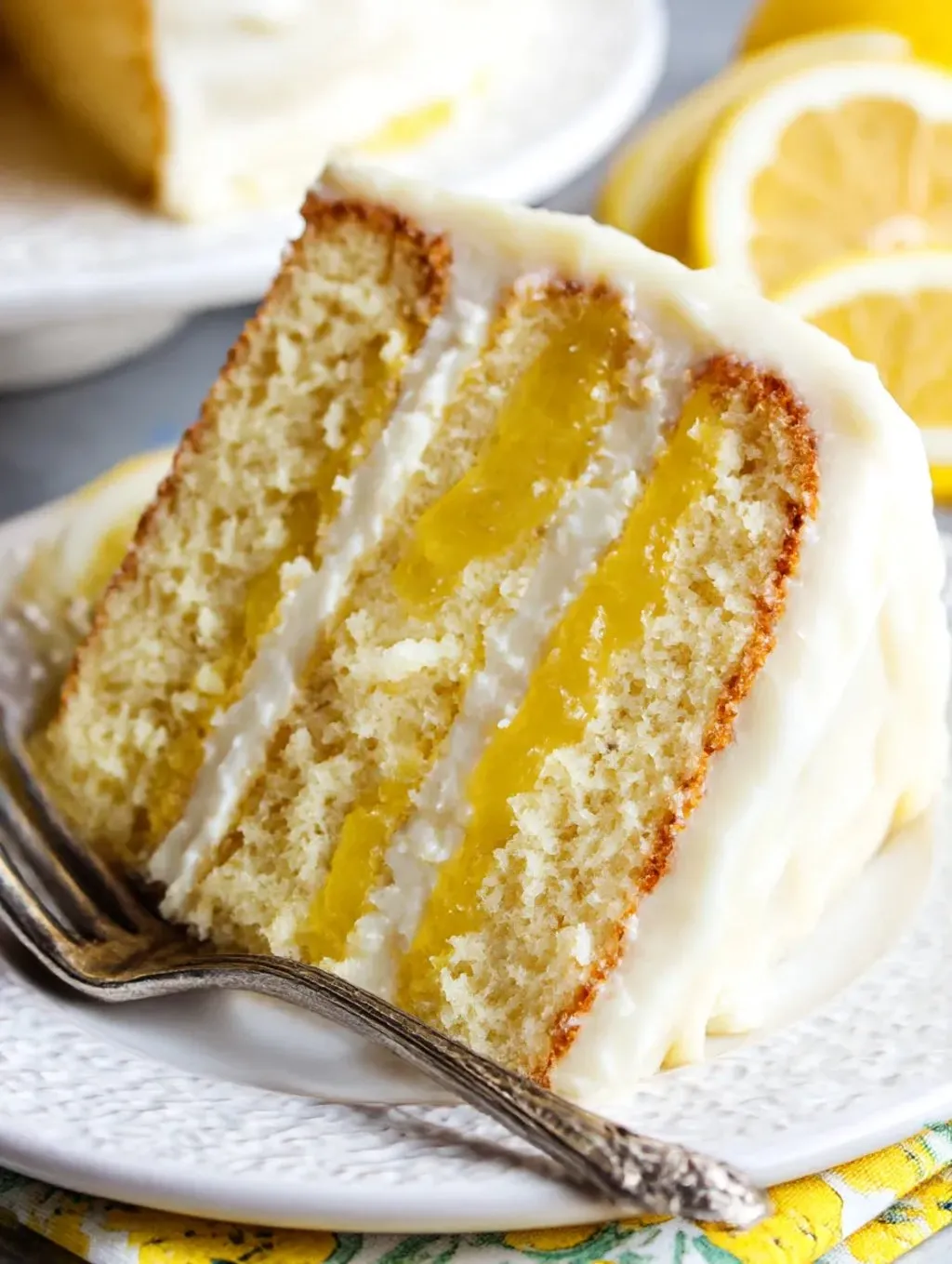 A slice of lemon curd cake.