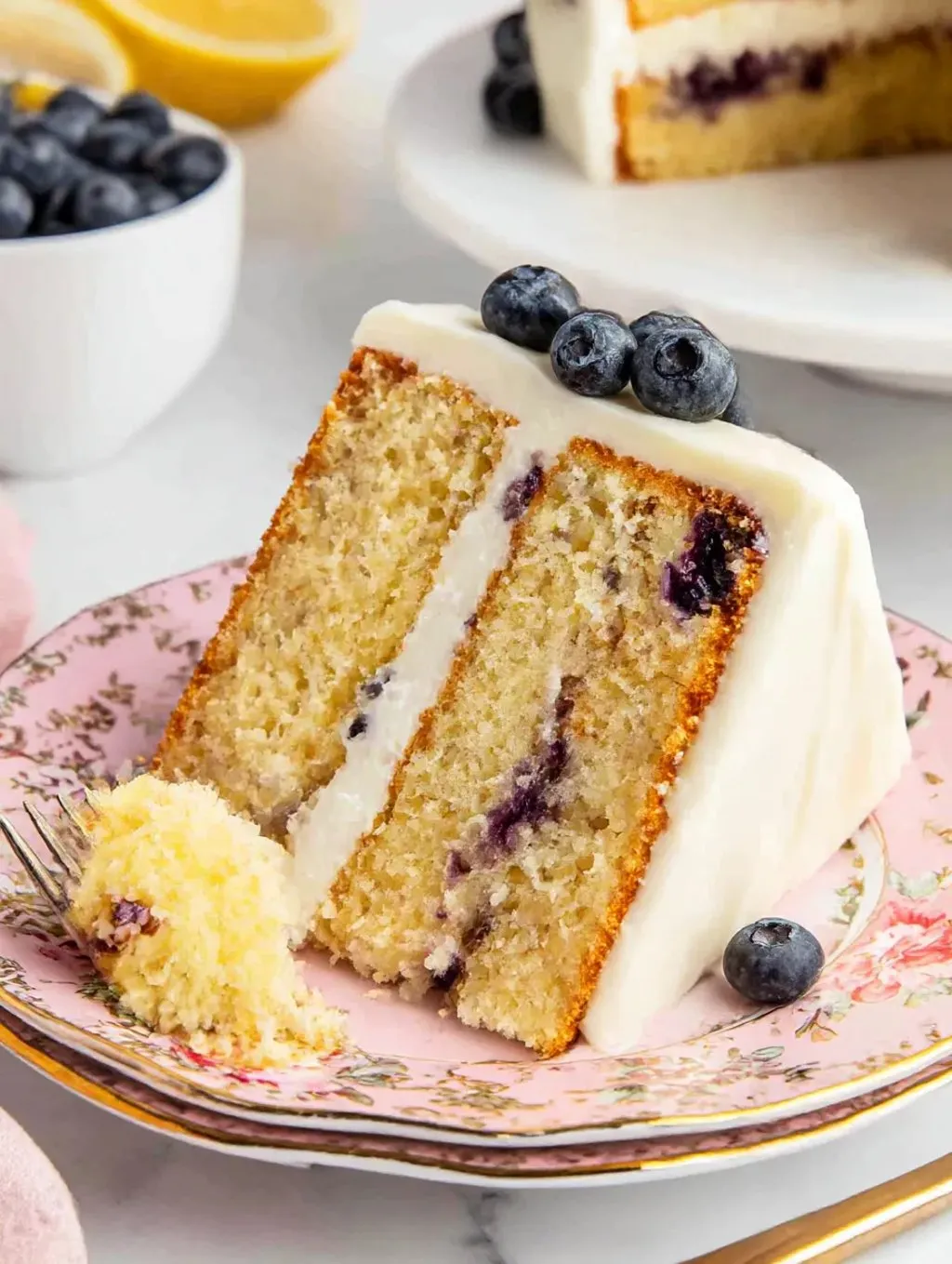 A slice of lemon blueberry cake.