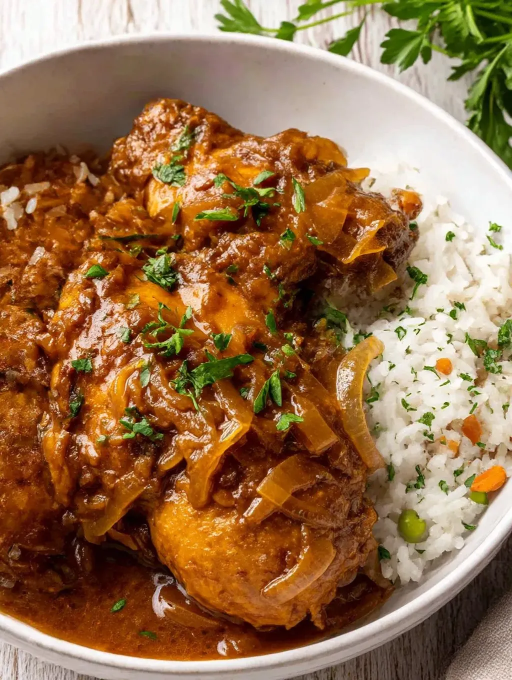 A bowl of chicken and rice.